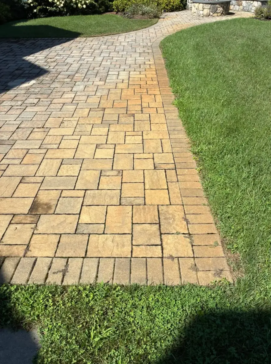 Before Irrigation Rust Stain Removal from a Paver Patio in Worcester County, MA — Pro Pressure Washing